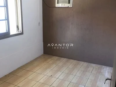 Cozinha com piso em cerâmica — Casa com 4 quartos para alugar em Camobi, Santa Maria/RS