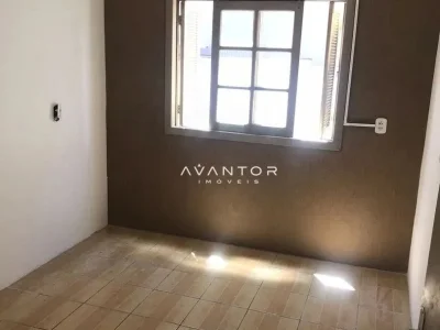 Dormitório com janela e parede pintada — Casa com 4 quartos para alugar em Camobi, Santa Maria/RS