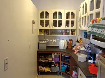 Cozinha com armários planejados — Casa com 2 quartos à venda em Tomazetti, Santa Maria/RS