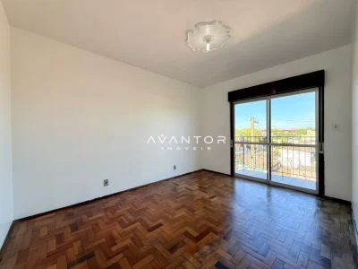 Sala de estar com sacada e vista externa — Apartamento com 3 quartos para alugar em Nossa Senhora do Rosário, Santa Maria/RS