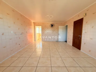 Cozinha com azulejos e piso cerâmico — Apartamento com 3 quartos para alugar em Nossa Senhora do Rosário, Santa Maria/RS