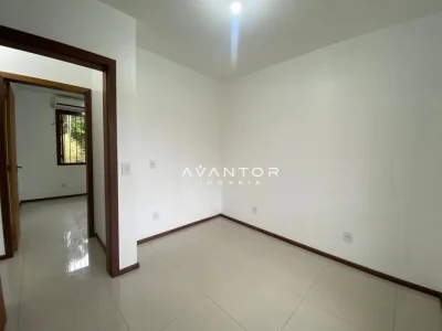 Dormitório com piso em cerâmica — Casa com 2 quartos para alugar em Camobi, Santa Maria/RS