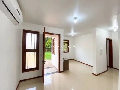 Hall de entrada com acesso ao pátio — Casa com 2 quartos para alugar em Camobi, Santa Maria/RS