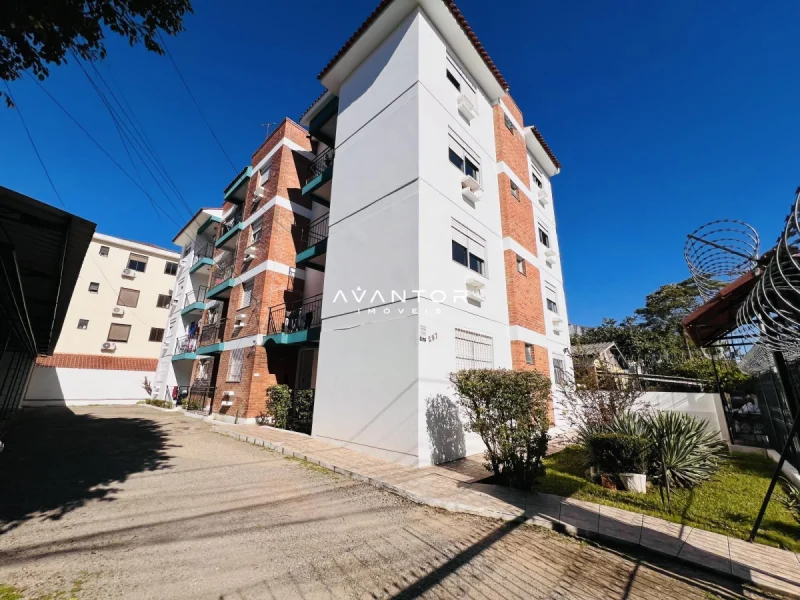 Fachada do prédio com tijolos aparentes — Apartamento à venda no Residencial Calegaro, em Camobi, Santa Maria/RS