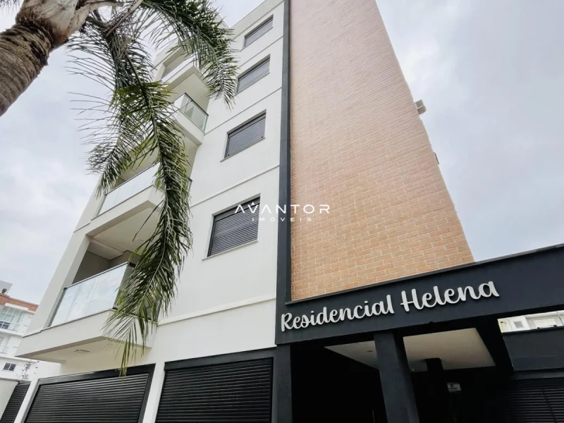 Fachada do prédio com palmeira — Apartamento com 2 quartos à venda no Residencial Helena, em Camobi, Santa Maria/RS