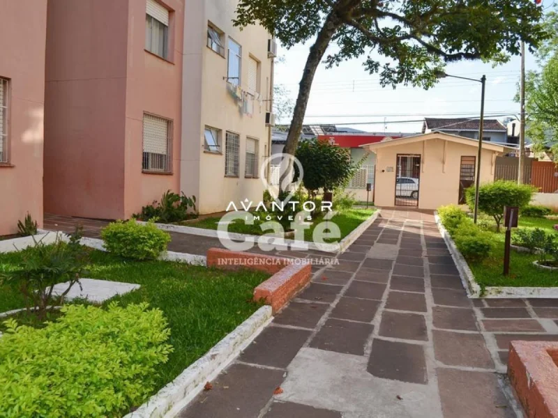 Pátio com jardim e área de circulação — Apartamento à venda no Conjunto de Residencial João Paulo I, em Nonoai, Santa Maria