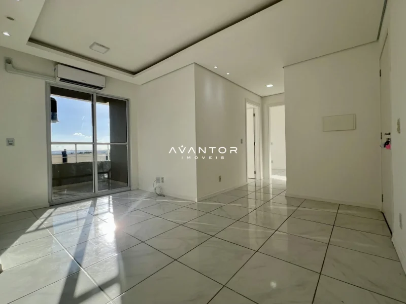 Sala de estar com sacada e vista para água — Apartamento à venda no Residencial Bella Morada, em Bonfim, Santa Maria/RS