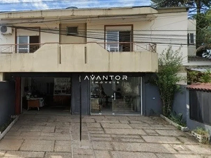 Fachada da casa com garagem — Apartamento com 2 quartos para alugar em Camobi, Santa Maria/RS