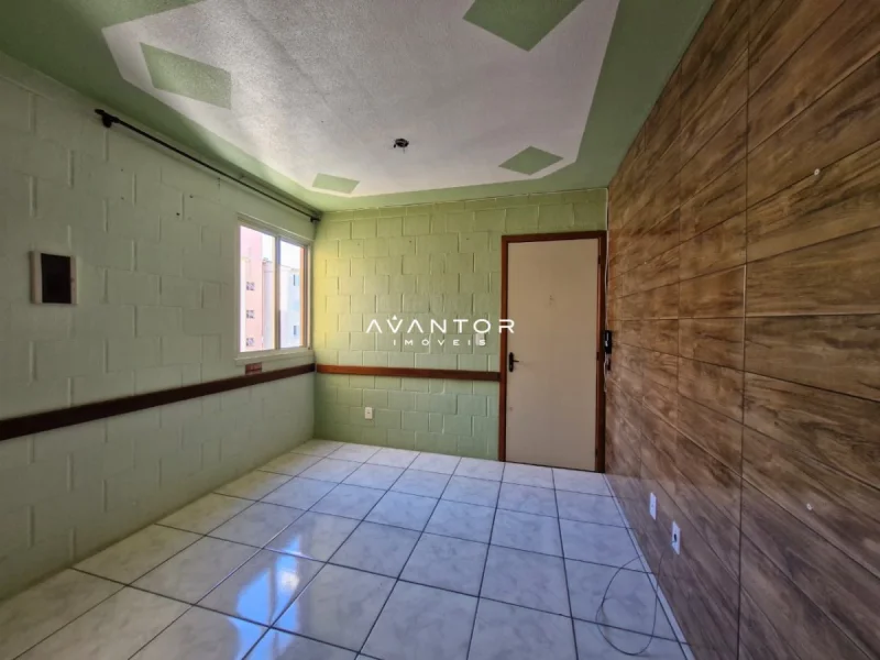 Dormitório com piso em cerâmica — Apartamento à venda no Condomínio Residencial Moradas do Parque I, Santa Maria