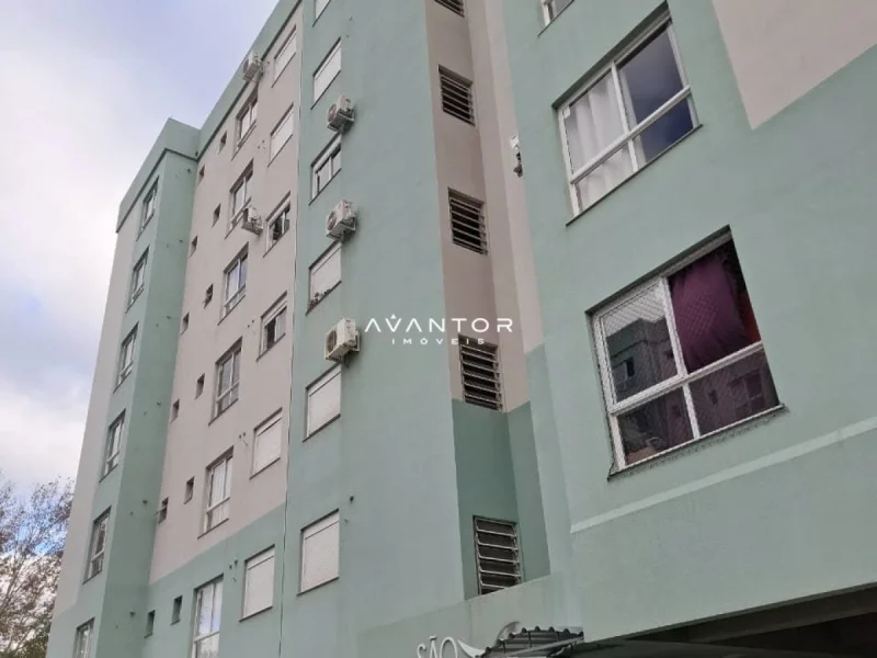 Fachada do prédio com acabamento em tons de verde — Apartamento à venda no Residencial São Francisco ( Coase ), Santa Maria