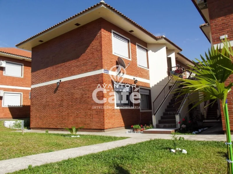 Fachada da casa com jardim frontal — Apartamento para alugar no Residencial Arco Verde, em Pinheiro Machado, Santa Maria/RS
