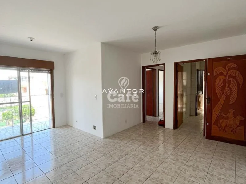 Sala de estar com acesso à sacada — Apartamento com 2 quartos à venda em Camobi, Santa Maria/RS
