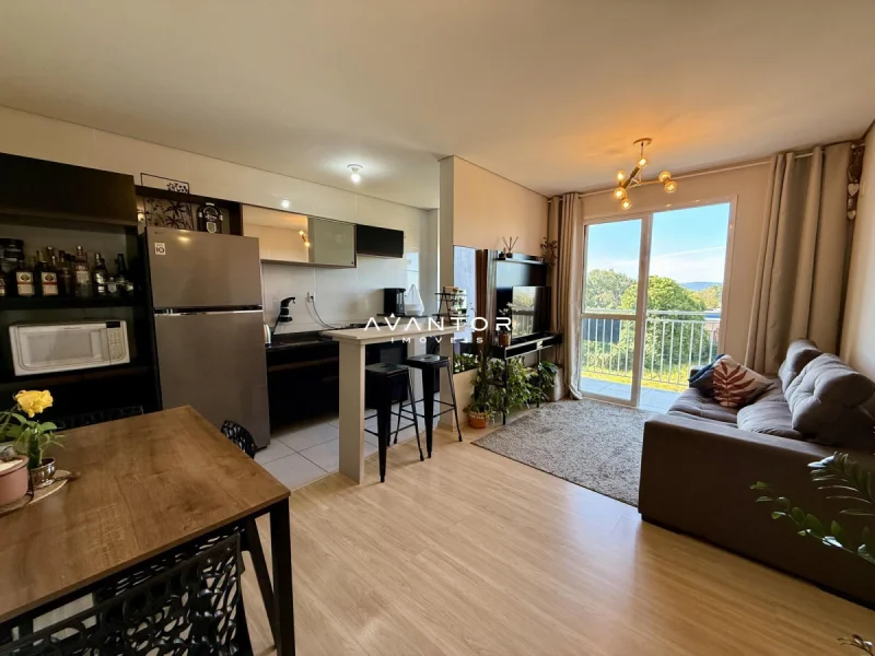 Sala integrada com cozinha e sacada — Apartamento à venda no Residencial Vila Di Fiori, em Camobi, Santa Maria/RS