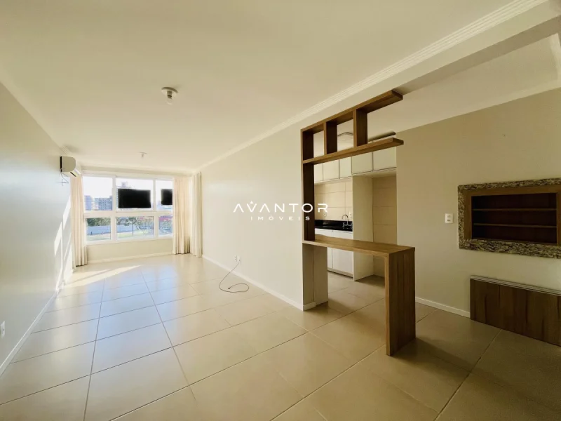 Sala integrada com cozinha e armários — Apartamento à venda no Residencial Draco, em Nossa Senhora das Dores, Santa Maria/RS