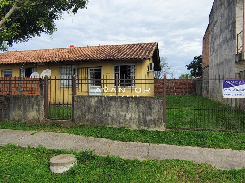 Fachada da casa com portão — Casa com 2 quartos à venda em Diácono João Luiz Pozzobon, Santa Maria/RS