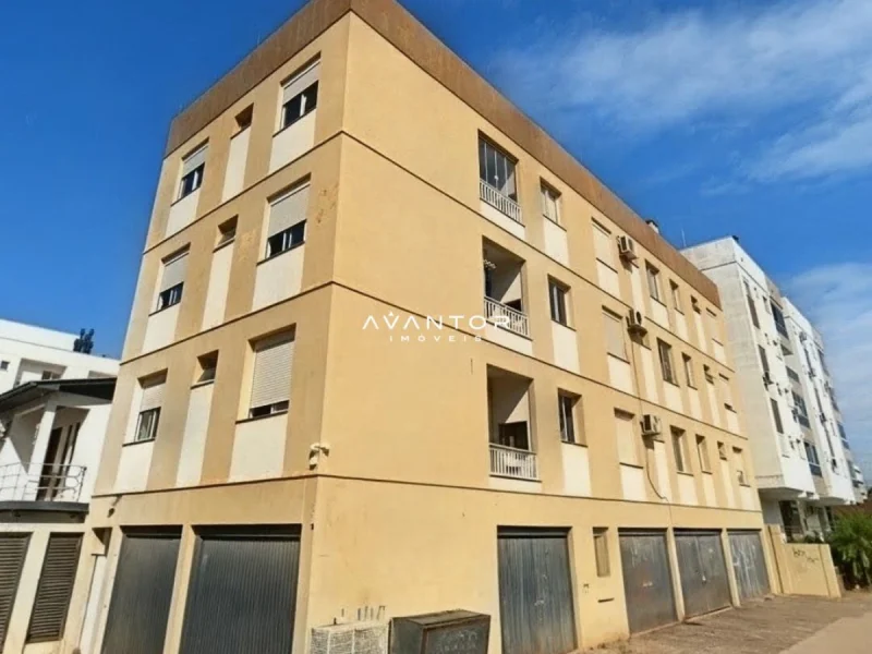 Fachada do prédio com garagem no térreo — Apartamento com 2 quartos à venda e para alugar em Camobi, Santa Maria/RS