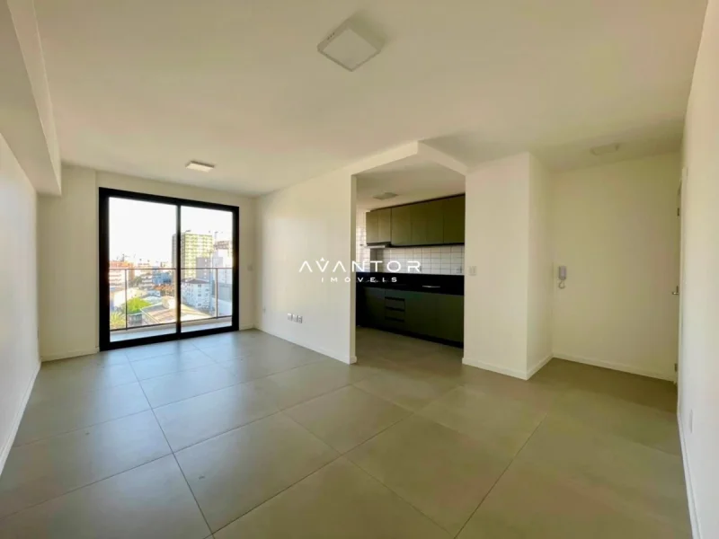 Sala integrada à cozinha com sacada — Apartamento à venda e para alugar no Residencial Livty, em Centro, Santa Maria/RS