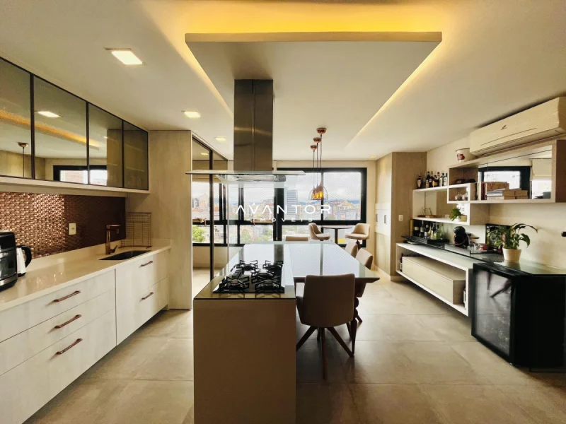 Cozinha integrada à sala com ilha — Apartamento à venda no Residencial Scenarium, em Nossa Senhora Medianeira, Santa Maria/RS